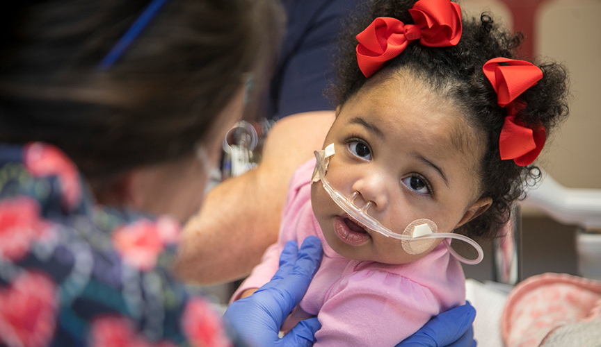 patient with a breathing tube over face